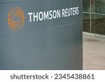 Small photo of London, United Kingdom - May 18, 2023: Thomson Reuters sign at their offices building in Canary Wharf. TR Group is Canadian multinational mass media and information firm