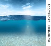 Small photo of The underwater world and the sea surface can be seen at the same time as if through a glass pane