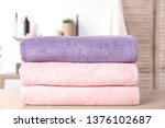 Stack Of Fresh Towels On Table...