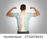 Man with healthy back on light...