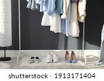 rack with stylish women's... | Shutterstock . vector #1913171404