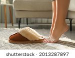 Woman with soft slippers at...