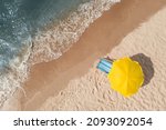 Yellow beach umbrella and...