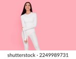 Woman in warm thermal underwear on pink background. Space for text