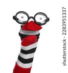 Small photo of Funny sock puppet with glasses isolated on white