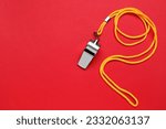 One metal whistle with cord on...