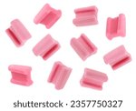 Small photo of Many bubble gum pillows falling on white background