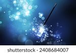 Small photo of Magic wand and enchanted lights on blue gradient background