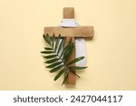 Wooden cross  white cloth and...
