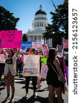 Small photo of SACRAMENTO, CA, U.S.A. - MAY 14, 2022: Photo of a woman holding a protest sign around in front of the state capitol during thRoe Bans off our Bodies March and Rally organized by Planned Parenthood.