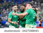 Small photo of Bundee Aki and Garry Ringrose celebrate a try during the Rugby union World Cup XV RWC match between Ireland and Scotland at Stade de France in Saint-Denis near Paris on October 7, 2023.