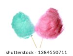 Different tasty cotton candies on white background