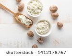 Composition with shea butter on light background