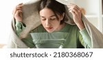 Small photo of Young woman doing steam inhalation at home to soothe and open nasal passages