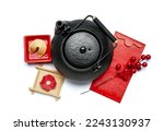 Teapot, fortune cookie, red envelope and Chinese symbols on white background. New Year celebration