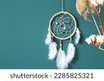 Dream catcher hanging on color...