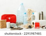 Small photo of Necessities for emergency bag on white table