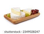 Wooden board with pieces of tasty Camembert cheese on white background