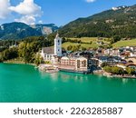 Idyllic View of St. Wolfgang Chapel and Village Waterfront. Explore the Serene Beauty of Wolfgangsee Lake in Austria