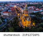 Aerial photo from a flight over the Timisoara Orthodox Cathedral and the illuminated city center.  Photo taken on 10th of August 2022, in Timisoara, Timis county, Romania.