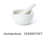 White ceramic mortar and pestle isolated on white background. Cliping path.