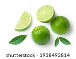Lime fruits with green leaf and ...