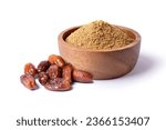 Date fruit powder in wooden bowl with dried dates palm fruits isolated on white background.