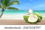 Small photo of Coconut water (coconut juice) and fresh green coconut on wooden table with coconut palm tree on beach and blue sky blurred background. Vacation and holiday concept.