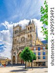 Small photo of Amiens Cathedral Basilica of Our Lady Roman Catholic Church on Place Notre Dame square in old historical city centre, Cathedrale Notre-Dame, France landmarks, Hauts-de-France Region, Northern France