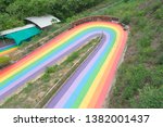 Top view colorful curve luge lane way for drive and race car with tire round be side lane to prevent shock.Drive ludge activities for family in holiday.