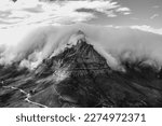 Iconic Table Mountain in Cape Town, South Africa, with dramatic "tablecloth" clouds; as seen from Lion