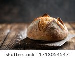 Rustic bread on a rustic background with copy space.