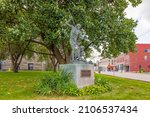 Small photo of Winamac, Indiana, USA - August 22, 2021: The Teacher, sculpture in Honor of the Miami and Potawatomi tribes by sculptor Casey Eskridge, The Pulaski County Courthouse