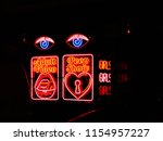 Small photo of Sleazy neon street signs