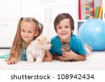 Happy Kids With Their Pets   A...