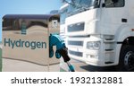 Small photo of Hydrogen filling station on a background of trucks