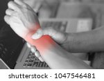 Man Holding Her Wrist Pain From ...