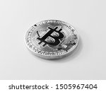 Bitcoin real coin made of steel on the surface, closeup, isolated on white background
