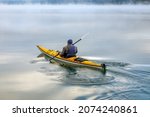 Lone Kayaker In Autumn Paddling ...
