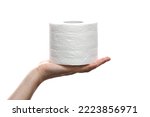 Close-up of a woman hand using toilet paper isolated on a white background. Hand holding roll of tissue paper. white roll toilet paper on female hand