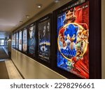 Small photo of Honolulu - April 11, 2022: Row of movie posters including Sonic the Hedgehog 2, Ambulance, Morbius and others outerside of movie theater in Kahala Mall.