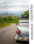 Small photo of Trinidad, Cuba - March 23 2019: Old vintage American car on a road outside Trinidad, Sancti Spiritus Province, Cuba, West Indies, Caribbean, Central America