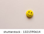 Funny smiley face on white background. The concept of positive mood. Empty text space.