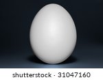 Small photo of Ab ovo. One vertical standing white hen egg