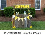 An empty lemonade stand ready for children to start selling lemonade on a hot summer day as their first business endeavor.