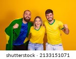 Small photo of Brazilian friends, Latin Americans, diversity, cheering for Brazil, in the 2022 world cup, vibrating and celebrating together, cheering on friends, watching the game together. screaming goal.
