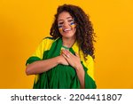 woman with hand on heart with sign of gratitude and patriot. September 7. Independence of Brazil.