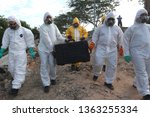 Small photo of 05 APRIL 2019. Hazmat team wearing a Hazmat suit to clean a river after toxic chemical were dumped into the Sungai Kim Kim, sickening thousand of people who inhale noxious fumes in Johor