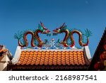 Small photo of Dragon statue decorate on the roof of Chinese Temple, Chinese Shrine, Joss house. Colorful of Chinese Culture. Thai-Chinese Cultural Centre udon thani province