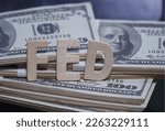 Small photo of Text FED message is placed on the dollar. Every meeting of the Fed and the economy.